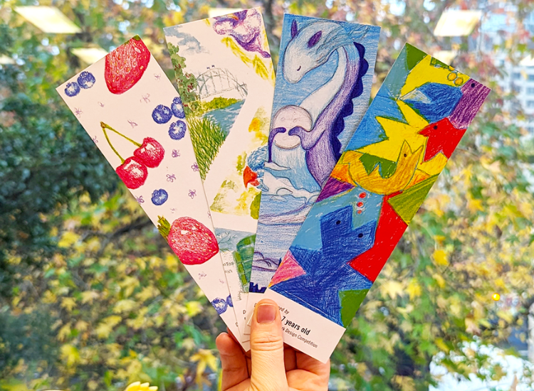 Image of 4 custom designed bookmarks being held up