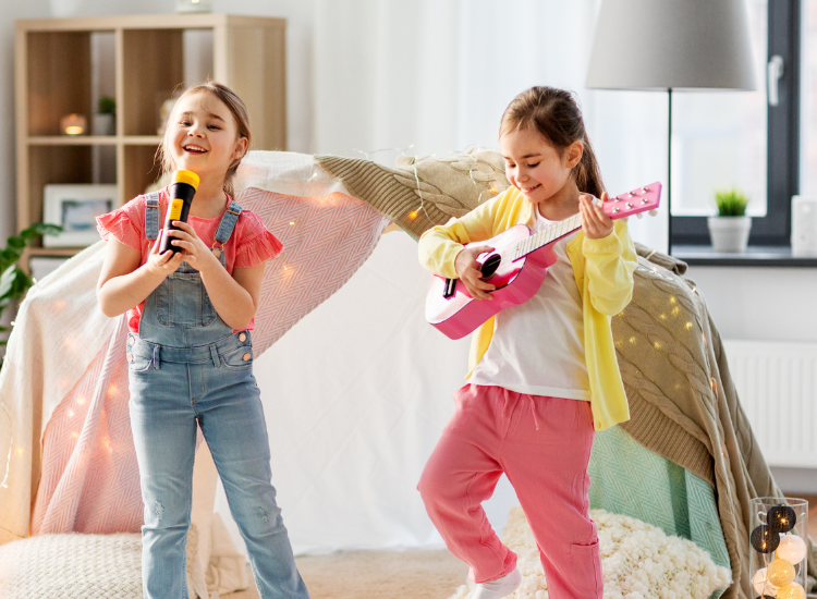 Two kids dancing and singing