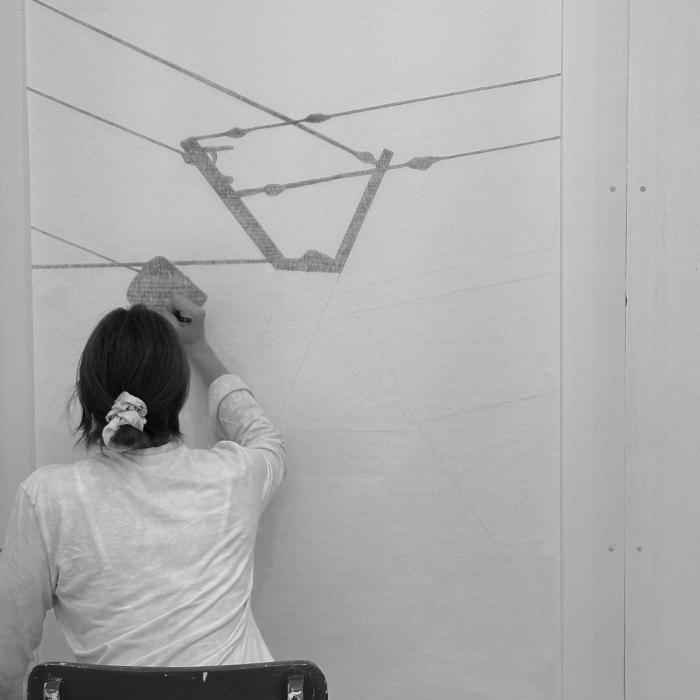 Artist working at an easel