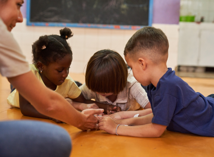 Children on the ground playing a game