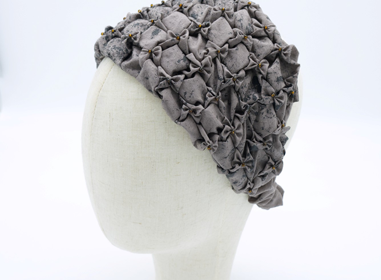 mannequin wearing a ruffled headband