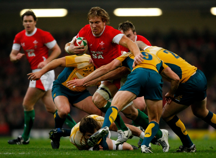 Britsh Irish Legends in a rugby tackle against classic Wallabies