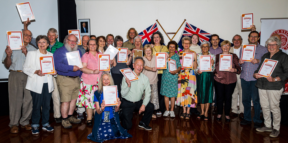 Community awards 2023 living legends award holding their certificates