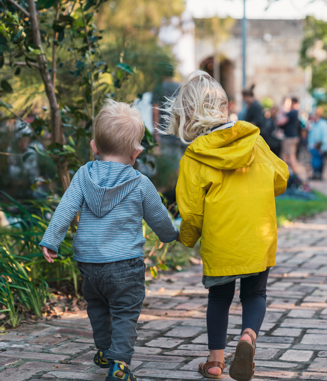 Two children holding hands