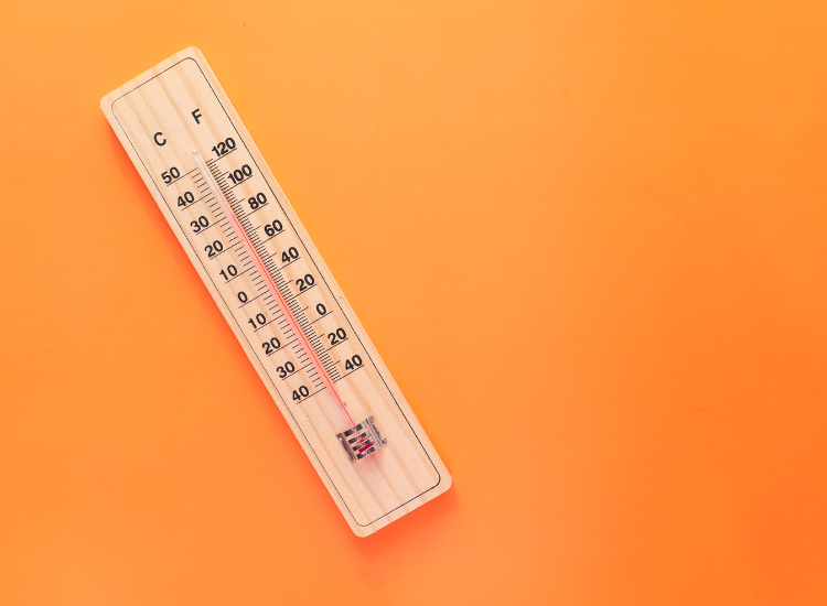 thermometer on a orange background
