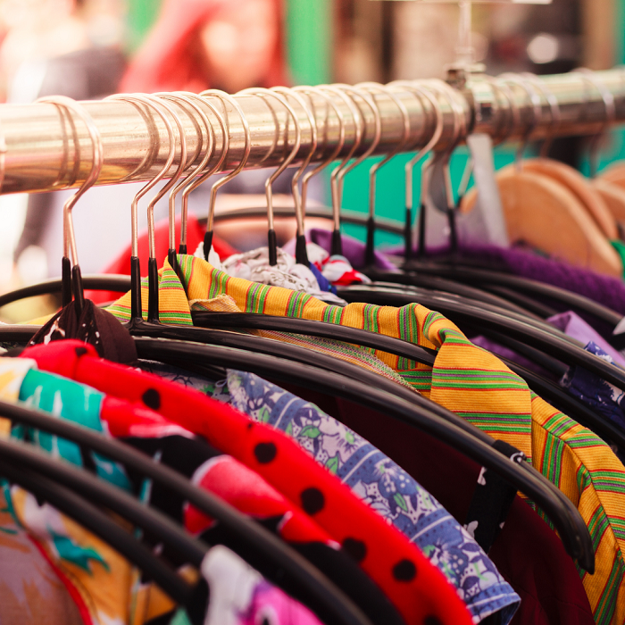 Colourful vintage clothing hanging on a rail