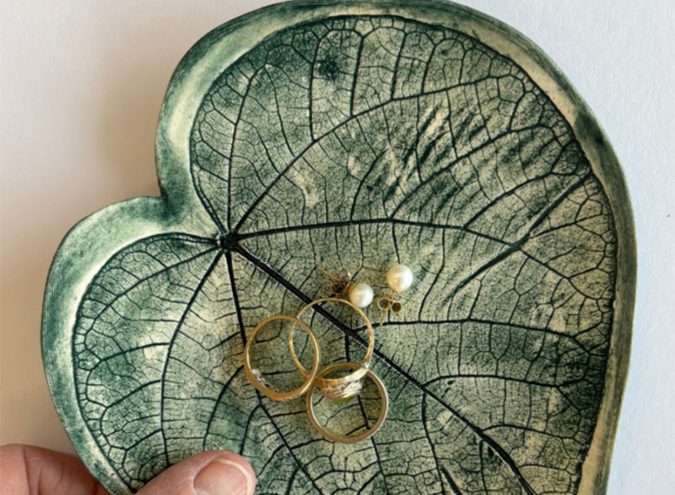 green trinket tray with gold rings