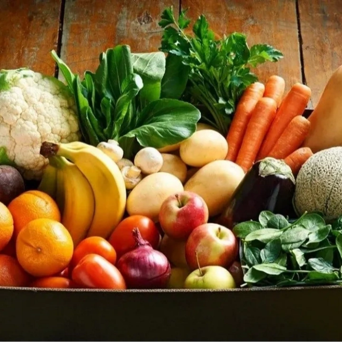 A box of colourful fruits and vegetables
