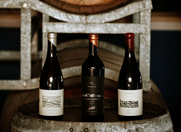 three bottles of red wine